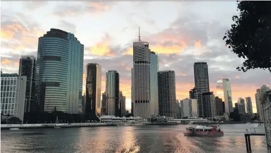  ?? PAT LEE/ SPECIAL TO POSTMEDIA NEWS ?? The Brisbane skyline at sunset. Air Canada recently launched direct flights between the Queensland capital and Vancouver.