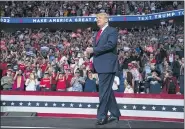  ?? ASSOCIATED PRESS FILE PHOTO ?? President Donald Trump arrives on stage to speak at a campaign rally at the BOK Center in Tulsa, Okla.