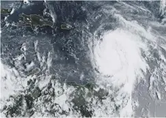  ??  ?? 0 Hurricane Maria heads north across the Caribbean yesterday
