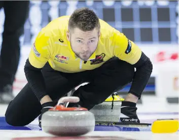 ?? ADRIAN WYLD/ THE CANADIAN PRESS ?? Mike McEwen of Winnipeg will be teaming up with his wife, Dawn, in pursuit of an Olympic berth in mixed curling doubles at the trials beginning Tuesday at Portage la Prairie, Man.