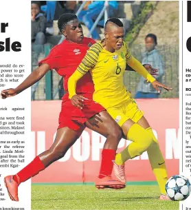  ?? Picture: SYDNEY MAHLANGU/BACKPAGEPI­X ?? IN THICK OF BATTLE: Kgaelebane Mohlakoana of South Africa is tackled by Saliva January of Malawi during Cosafa Women’s Championsh­ip match between the countries on Monday at Wolfson Stadium in Port Elizabeth