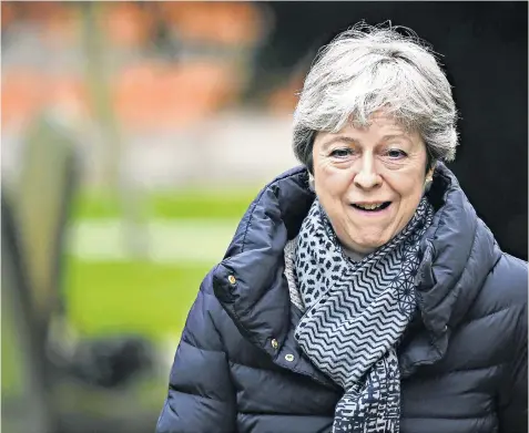  ??  ?? Theresa May at church yesterday in Maidenhead ahead of another testing week at Westminste­r