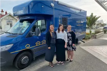  ??  ?? BNZ’s banking team, Joelle Mansell, Brittanny Mitchell and Synthia Van Der Werf with the mobile bank.