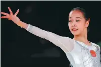  ?? XINHUA ?? Zhang Jin competes in the floor exercise as part of China’s gold medal effort in the women’s team competitio­n on Wednesday.