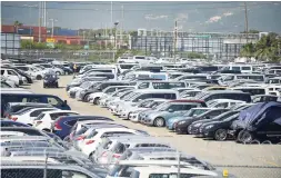  ??  ?? Scores of cars will pass through the KWL Global Logistics Centre in Kingston, which was commission­ed into service yesterday.