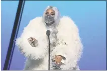  ?? COURTESY OF MTV ?? Lady Gaga accepts the award for artist of the year during the MTV Video Music Awards.