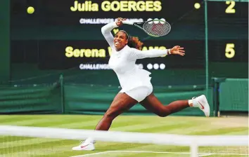  ?? Reuters ?? Serena Williams powers a forehand shot during her semi-final match against Julia Goerges at the All England Club yesterday. The American won 6-3, 6-3 in just 67 minutes.