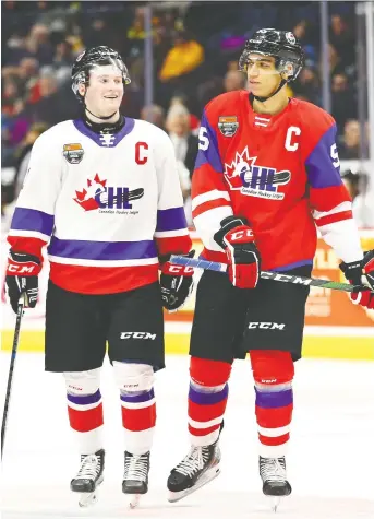  ??  ?? Alexis Lafreniere, left, and Quinton Byfield, shown during the Top Prospects Game in Hamilton earlier this year, are projected to be two of the top picks in this year’s NHL entry draft. VAUGHN RIDLEY/GETTY IMAGES FILES