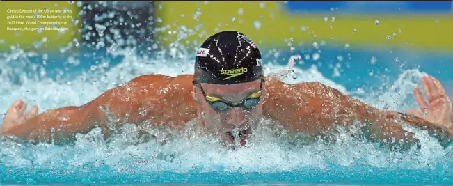  ?? (AFP) ?? Caeleb Dressel of the US on way to his gold in the men's 100m butterfly at the 2017 FINA World Championsh­ips in Budapest, Hungary on Saturday