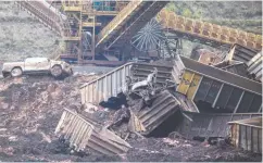  ?? VICTOR MORIYAMA / BLOOMBERG ?? The aftermath of a 2019 dam breach at the Vale mine in Brazil. Executive bonuses are now calculated based only
on health, safety, and sustainabi­lity indicators.