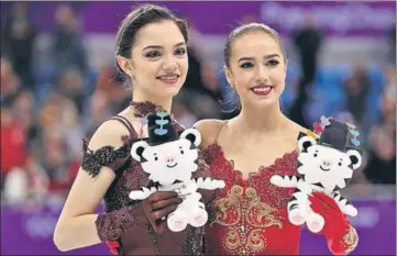  ?? REUTERS ?? Alina Zagitova (right), 15, beat her training partner Evgenia Medvedeva,18, by a mere 1.31 points to the figure skating gold. ■