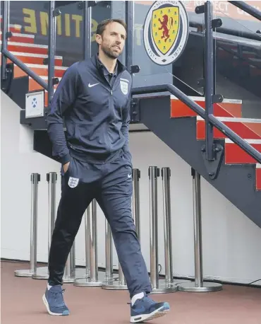  ??  ?? Gareth Southgate walks out the tunnel at Hampden on the eve of today’s World Cup qualifier.