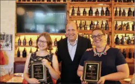  ?? SUBMITTED PHOTO ?? State Senator Daylin Leach recognizes Elizabeth Barrie (left) of the Belmont Hills Library and Jennifer McKinnon (right) of Gotwals Elementary School as the 2019 Librarians of the Year at Leach’s 10th annual Librarian of the Year Award Ceremony on Monday, June 10, 2019, at Pietro’s Coal Oven Pizzeria in Radnor.