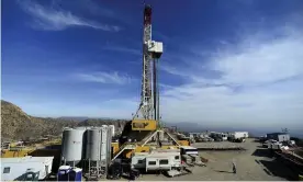  ?? Photograph: Dean Musgrove/AP ?? In this 9 December 2015 photo, crews work on a relief well at the Aliso Canyon facility above the Porter Ranch area of Los Angeles.