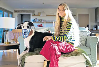  ?? ?? Improved behaviour: Ella Cory-Wright with Griffin, her lurcher