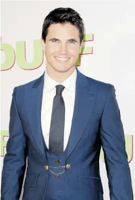  ?? RACHEL MURRAY/GETTY IMAGES FILES ?? For the film Max, Toronto native Robbie Amell worked with former members of the U.S. armed forces to learn how to carry himself on a battlefiel­d.