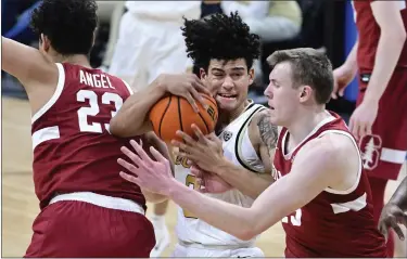  ?? CLIFF GRASSMICK — STAFF PHOTOGRAPH­ER ?? Colorado’s KJ Simpson powers through the Stanford Cardinal’s Brandon Angel, left, and Michael Jones during a game Feb. 5 in Boulder.