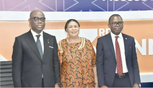  ?? ?? L-R: Herbert Wigwe, group managing director/CEO, Access Bank Plc.; Ajoritsede­re Awosika, chairman; and Sunday Ekwochi, company secretary, at the bank’s 33rd annual general meeting in Lagos, recently.