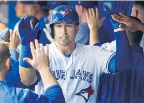  ?? — THE CANADIAN PRESS FILES ?? The Jays’ once-maligned US$8.25-million extension for Justin Smoak suddenly looks like a massive bargain.