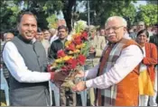  ?? HT PHOTO ?? Haryana chief minister Manohar Lal Khattar being greeted by minister of state for public health Engineerin­g Banwari Lal in Chandigarh on Monday.