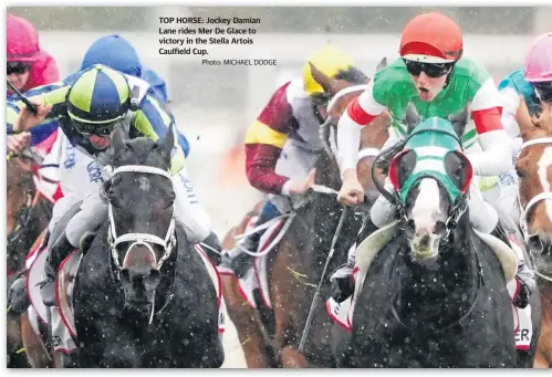  ?? Photo: MICHAEL DODGE ?? MATT JONES
TOP HORSE: Jockey Damian Lane rides Mer De Glace to victory in the Stella Artois Caulfield Cup.