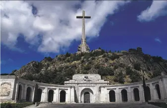  ?? Oscar Del Pozo / AFP / Getty Images ?? Gen. Francisco Franco had this monument built, in part with forced labor, to honor those who “fell for God and Spain” during the nation’s civil war. It is also Franco's final resting place.