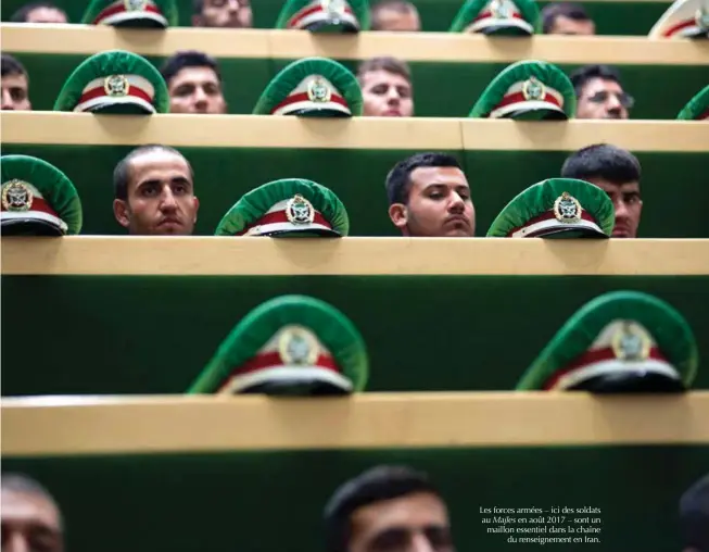  ?? © Xinhua/ahmad Halabisaz ?? Les forces armées – ici des soldats au Majles en août 2017 – sont un maillon essentiel dans la chaîne du renseignem­ent en Iran.