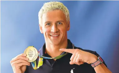  ?? HARRYHOW/GETTY IMAGES ?? U.S. swimmer Ryan Lochte has won 12 career Olympic medals and also has a seemingly insatiable appetite for attention.