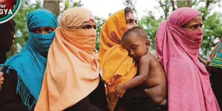  ?? REUTERS PIC ?? Rohingya refugees waiting for aid at the Kutupalong refugee camp near Cox’s Bazar, Bangladesh, on Thursday.