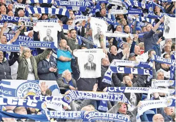  ??  ?? Leicester City fans paid tribiute to the club's late owner at last week's match in Cardiff. - AFP photo