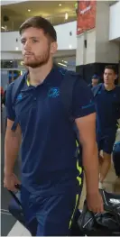  ??  ?? Leinster’s Ross Byrne arrives at OR Tambo Airport in Johannesbu­rg