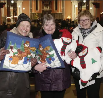  ??  ?? Polly O’Reilly, Jackie Fulham and Frankie Thivierge (visiting from Canada) who came well prepared with their Christmas cushions.