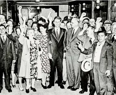  ?? ASSOCIATED PRESS ?? With his parents and supporters, John F. Kennedy celebrates in Boston after being elected to Congress in 1946.