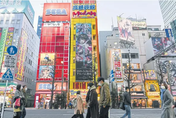  ?? PHOTOS BY THE NEW YORK TIMES ?? Tokyo’s Akihabara district, a centre of anime culture. The industry’s boom has only widened the gap between profits and wages.