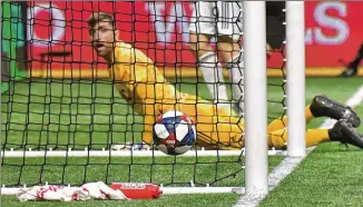  ?? HYOSUB SHIN / HYOSUB.SHIN@AJC.COM ?? New England Revolution goalkeeper Matt Turner reacts to Atlanta United defender Franco Escobar’s goal Saturday at Mercedes-Benz Stadium.