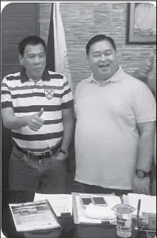  ??  ?? President Duterte poses with Ozamiz Mayor Reynaldo Parojinog in a photo posted on Oras Na, Roxas Na’s Facebook page on July 12, 2016.
