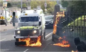  ?? Photograph: Press Eye Photograph­y ?? Youths hurled petrol bombs at police vehicles at the entrance to the City Cemetery after a parade to commemorat­e the 1916 Easter Rising.