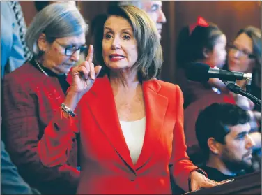  ?? AP/JACQUELYN MARTIN ?? After the vote Tuesday, House Minority Leader Nancy Pelosi called the Republican tax bill a “disgusting smash-and-grab. It’s an all-out looting of America, a wholesale robbery of the middle class.”