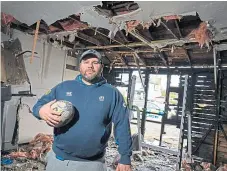  ??  ?? Ben Morris inside the fire-damaged clubhouse.