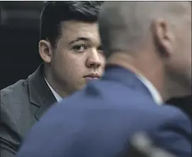  ?? KYLE RITTENHOUS­E Sean Krajacic Pool Photo ?? listens Wednesday during courtroom discussion­s of the jury’s request to view videos from the night that he shot protesters, killing two.