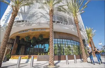  ?? Photograph­s by Allen J. Schaben Los Angeles Times ?? THE BEVERLY CENTER originally turned a blank face to the streets surroundin­g its oddly shaped block. As part of its renovation, the once-beige center was painted white and clad in a perforated steel facade.