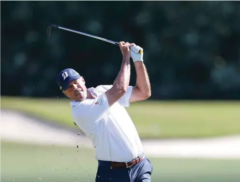  ?? (AFP) ?? Matt Kuchar of the United States plays a shot on the third hole during the second round of the Sony Open In Hawaii at Waialae Country Club in Honolulu, Hawaii, on Friday.