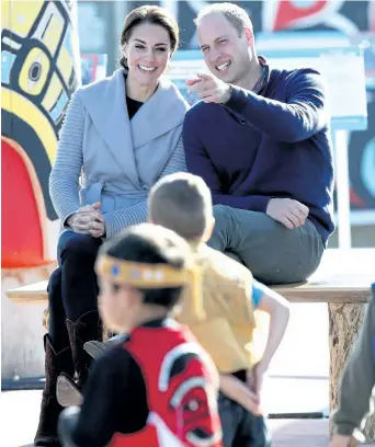  ?? CHRIS JACKSON/GETTY IMAGES ?? Catherine, Duchess of Cambridge and Prince William, Duke of Cambridge watch a cultural welcome in Carcross during the Royal Tour of Canada on Wednesday.