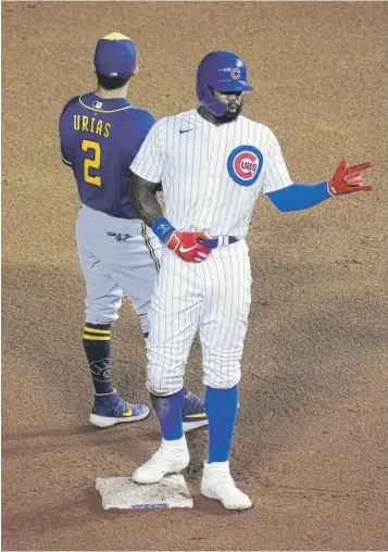  ?? GETTY IMAGES ?? The Cubs’ Jason Heyward reacts after hitting a double in the sixth inning Friday against the Brewers.