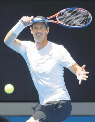 ?? KIN CHEUNG/ASSOCIATED PRESS ?? Scotsman Andy Murray hits a forehand during a practice session Saturday ahead of the Australian Open tennis championsh­ips in Melbourne. His first-round opponent is 22nd seed Roberto Bautista Agut of Spain.