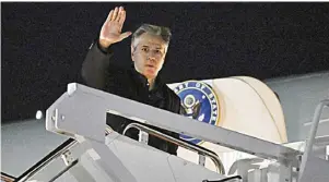  ?? ?? US Secretary of State Antony Blinken waves as he boards his plane at Andrews Air Force Base in Maryland. Blinken opens a week-long tour of Africa’s west coast as he seeks to bolster US-friendly democracie­s as security deteriorat­es in the Sahel.