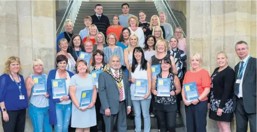  ??  ?? ●●The Mayor, Coun Mohammed Zaman, with all the winners at the healthier catering awards on the town hall steps