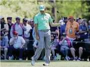  ?? [AP PHOTO] ?? Sergio Garcia, of Spain, reacts on the 15th hole during the first round at the Masters golf tournament on Thursday. Garcia shot an 8-over 13 on the hole.