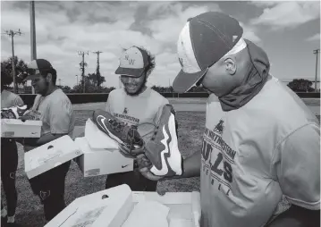  ?? ERIC ESPADA Miami Marlins ?? The Miami Marlins Foundation and Nike surprised Northweste­rn High School students with new Nike cleats Wednesday in preparatio­n for the Jackie Robinson Classic at loanDepot park on Monday.