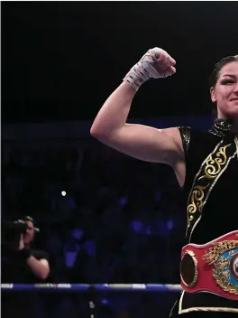  ??  ?? Queen of the World! Katie Taylor celebrates following her WBO Women’s Super-L